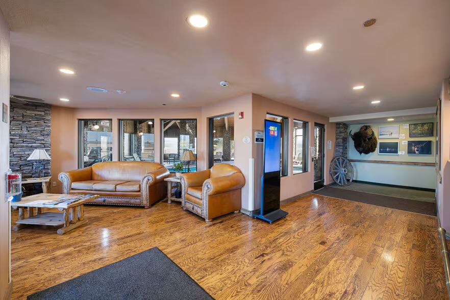Lobby with bison sculpture at Pinedale Suites